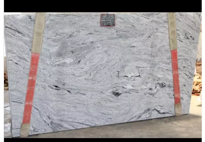 https://www.archcitygranite.com/wp-content/uploads/2015/12/Silver-Cloud-Granite-666x462.jpg.webp